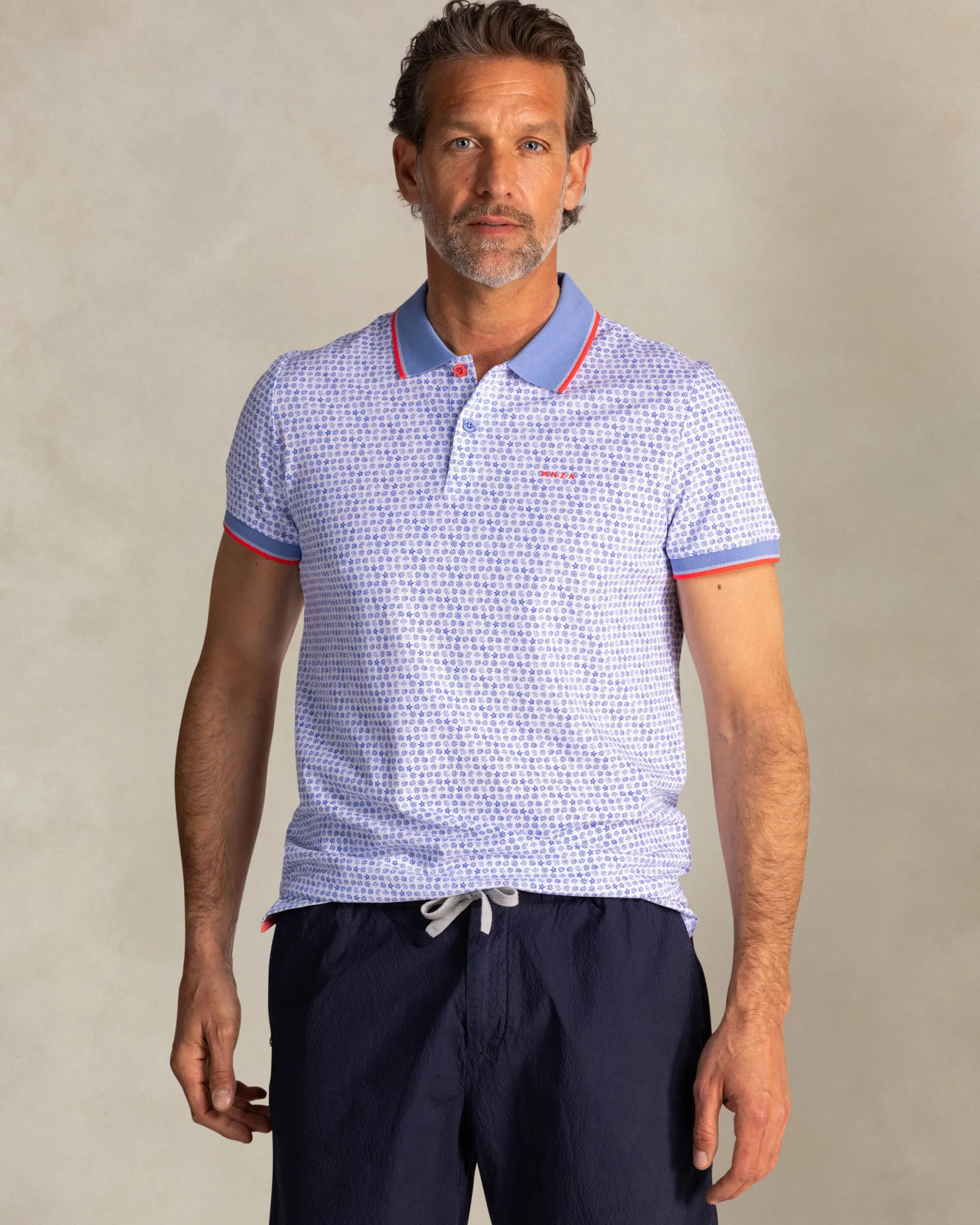 Blue cotton polo with graphic print
