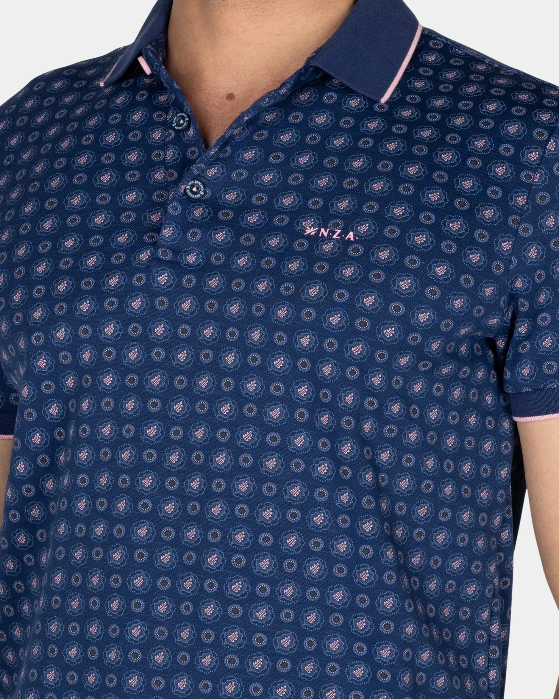 Blue Polo with a print of small polka dots