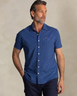 Blue shirt with small white dots