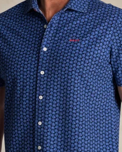 Blue shirt with small white dots