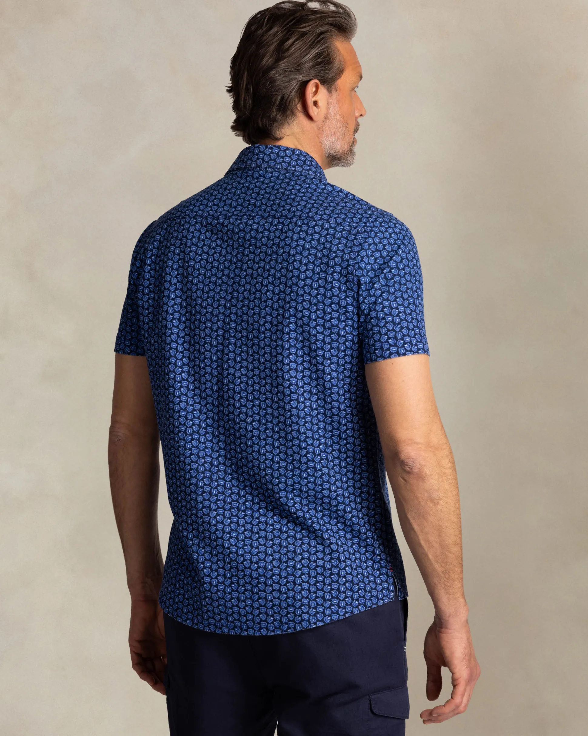 Blue shirt with small white dots