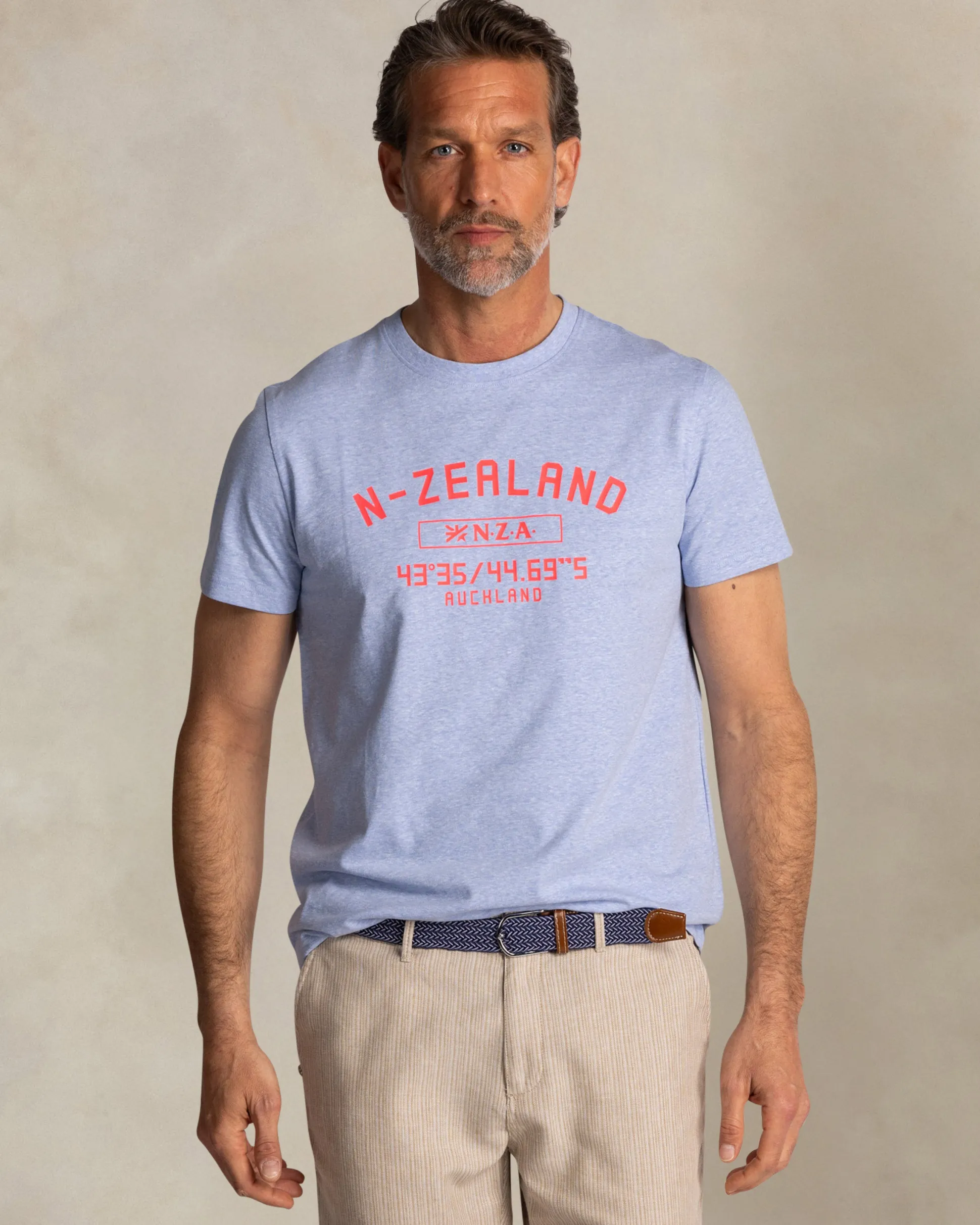 Blue T-shirt with NZA logo on the chest