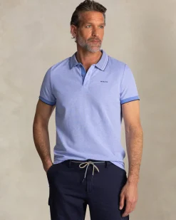 Bright blue polo with striped collar