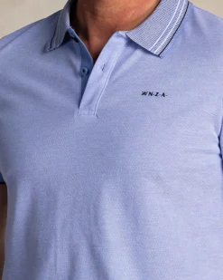 Bright blue polo with striped collar