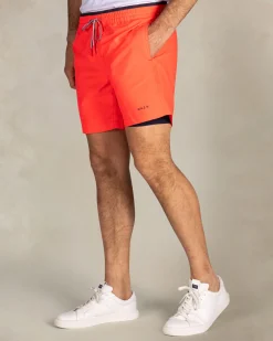 Bright red swim shorts with navy details