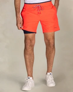 Bright red swim shorts with navy details