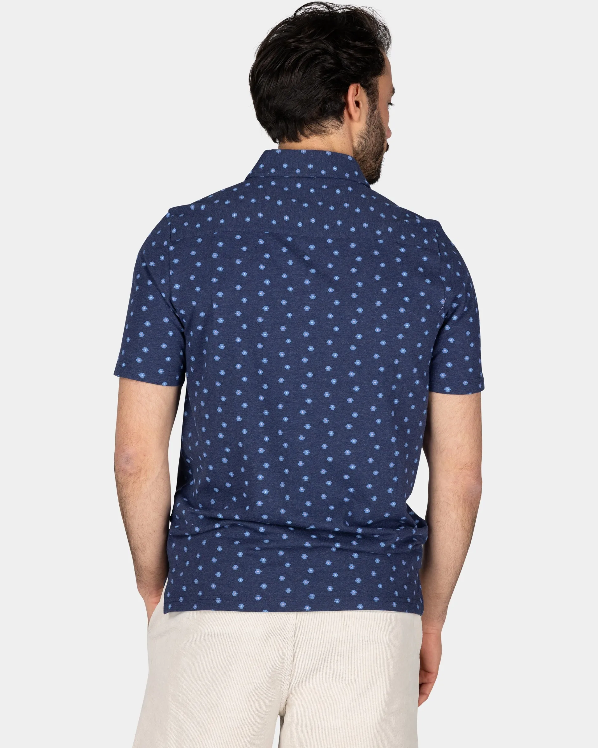 Cotton Blue Polo with a print of small polka dots