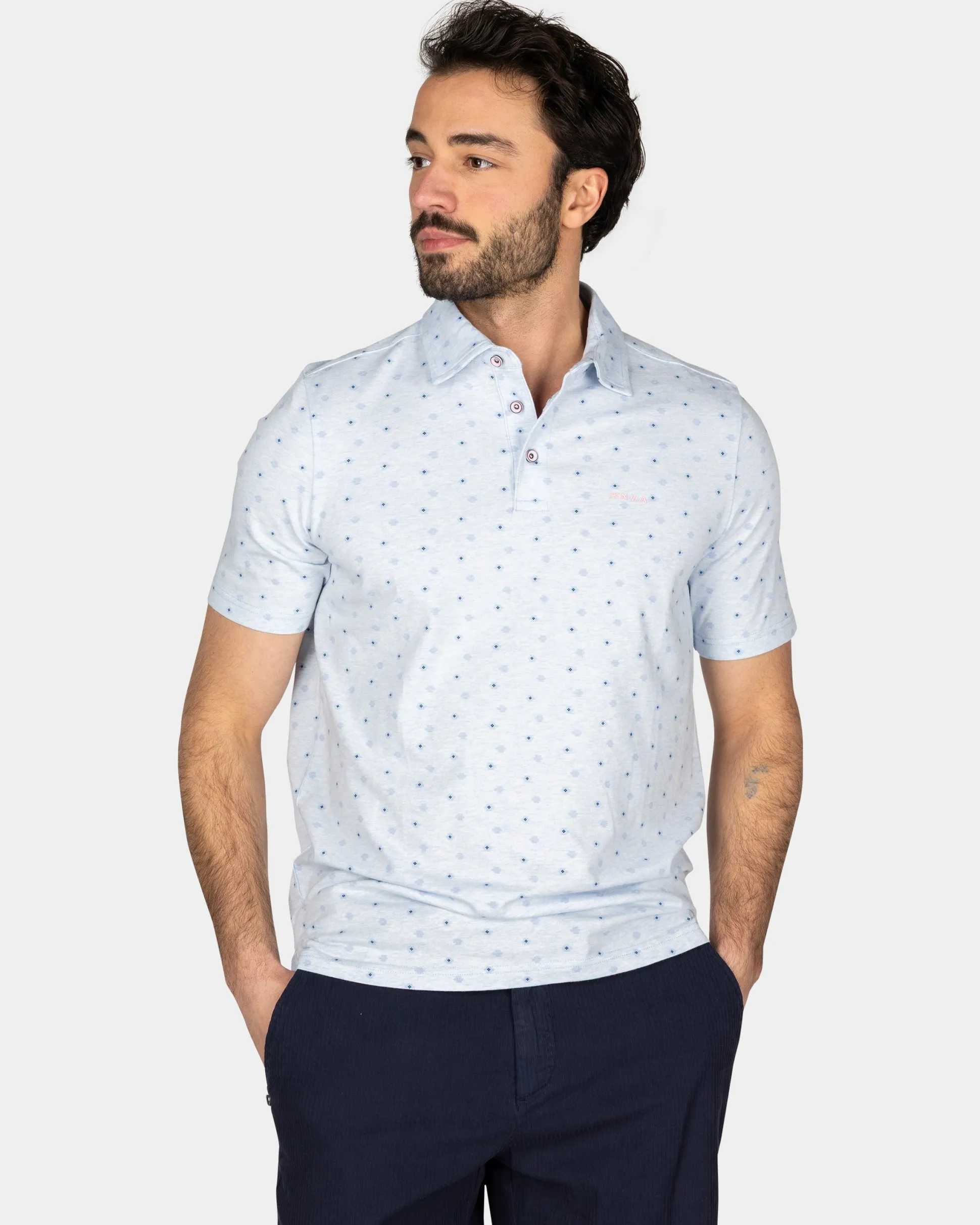 Cotton Pastel Blue Polo with a print of small polka dots