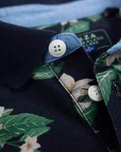 Dark blue polo with floral print