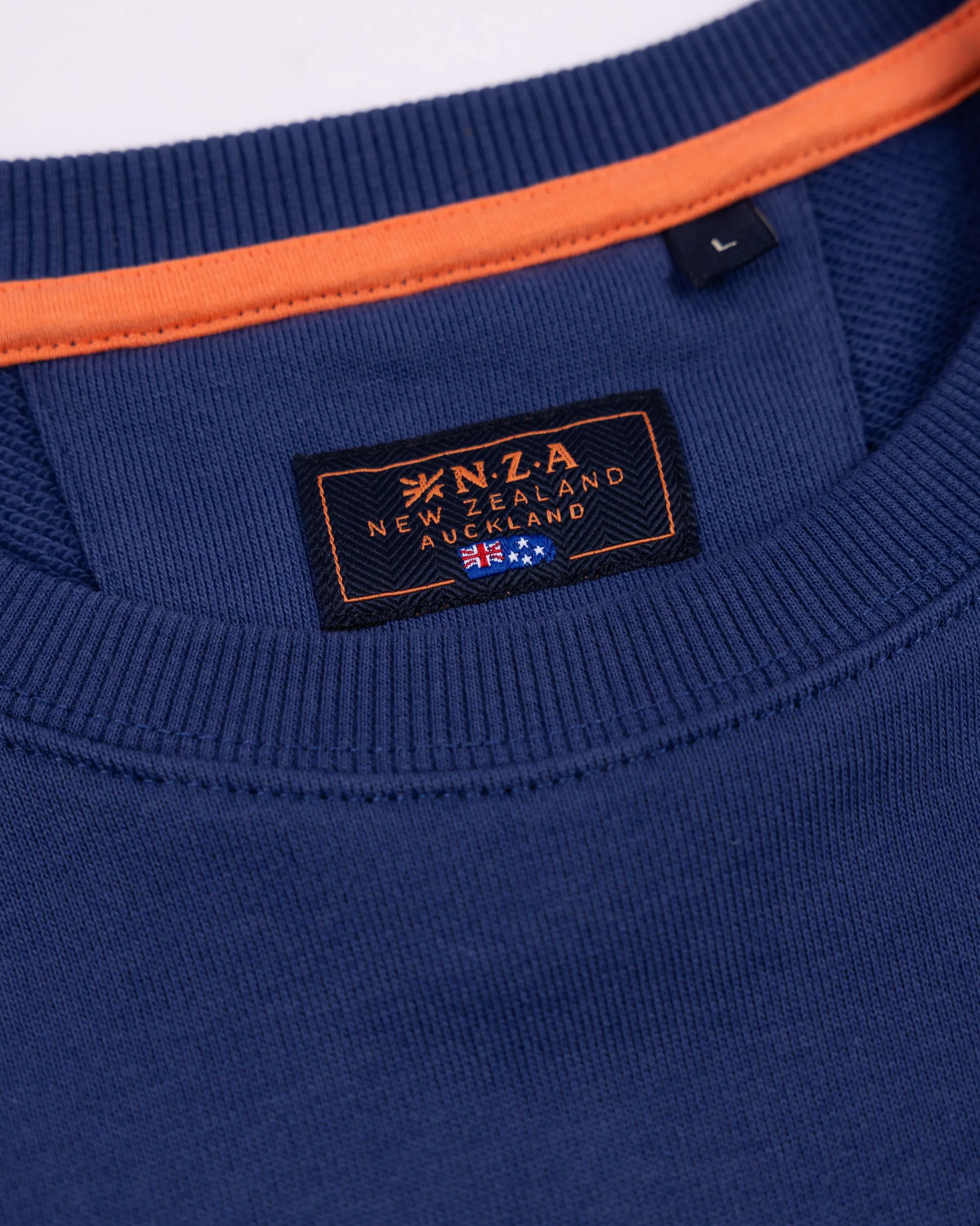 Dark blue sweater with light blue stripes