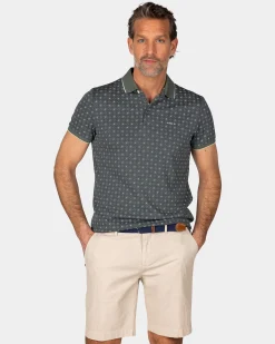 Green Polo with a print of small polka dots