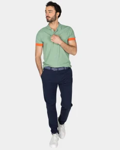 Green polo with orange accents