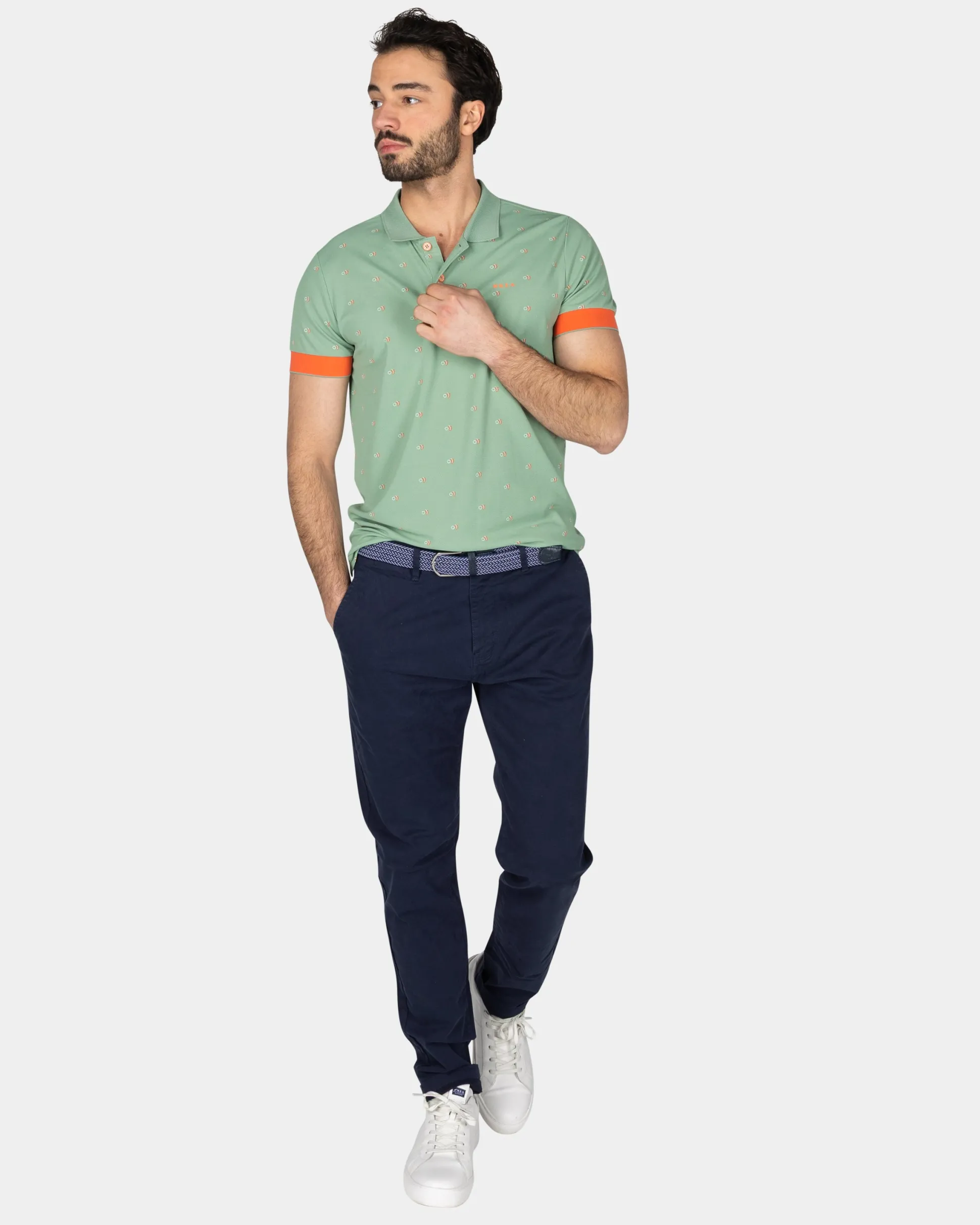 Green polo with orange accents