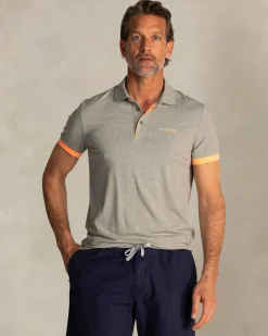 Green polo with orange details