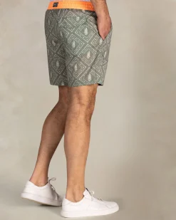 Green printed swim shorts with orange trim
