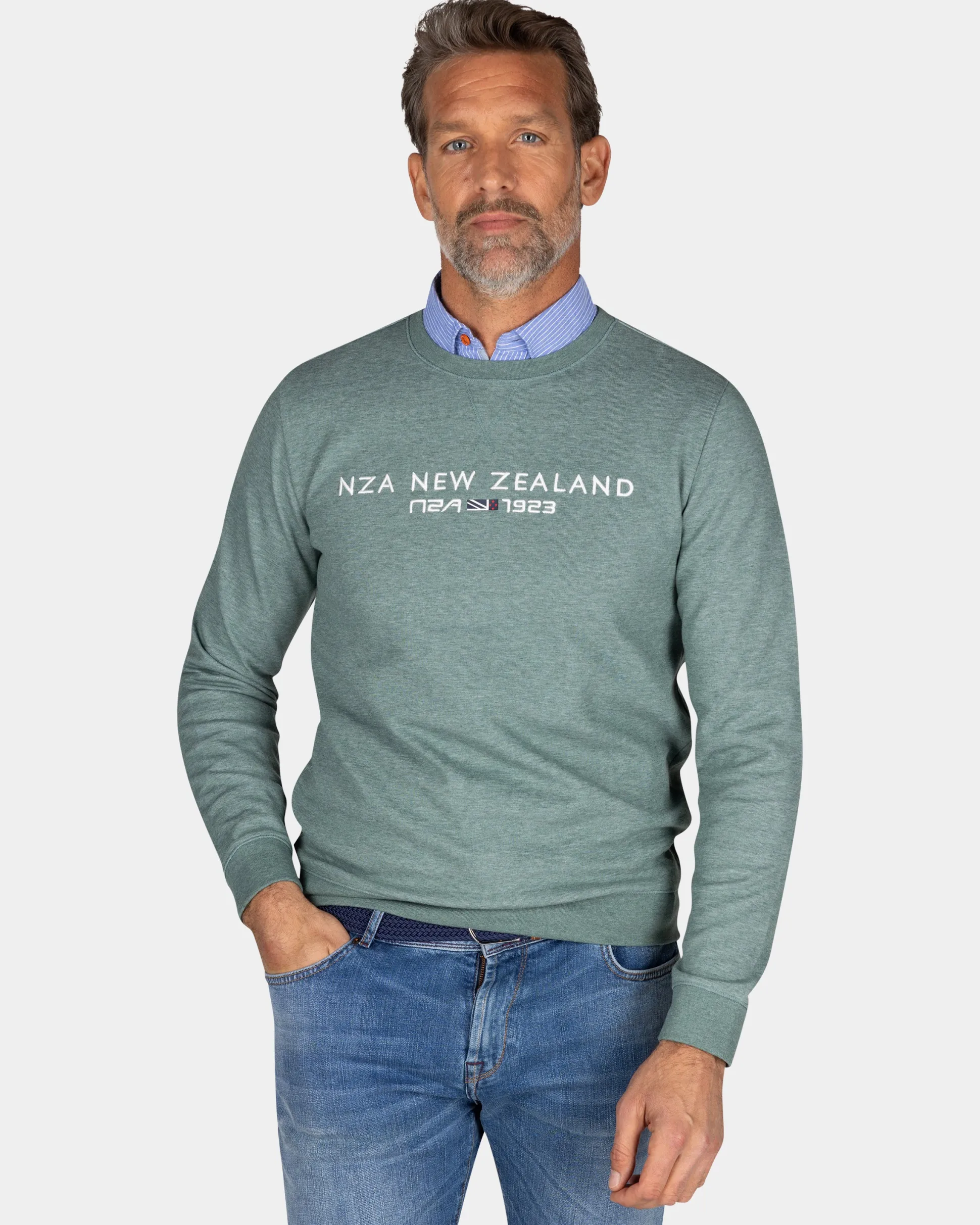 Green sweater with chest text - Pebble Green