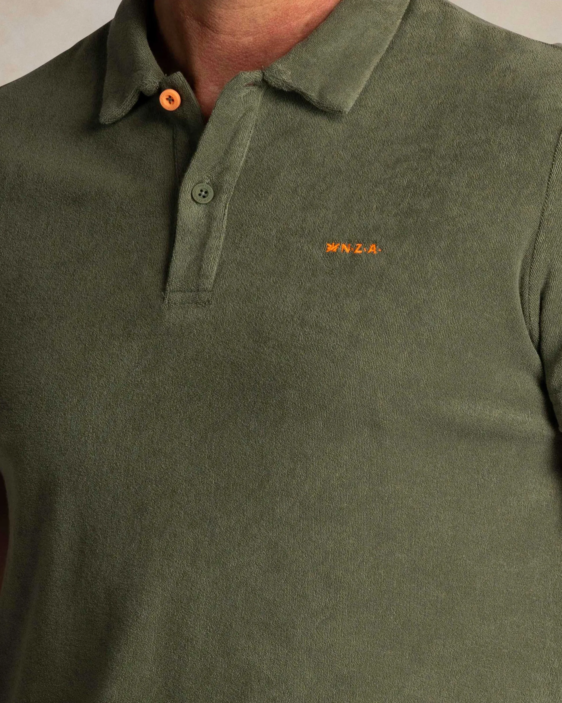 Green terry cloth polo