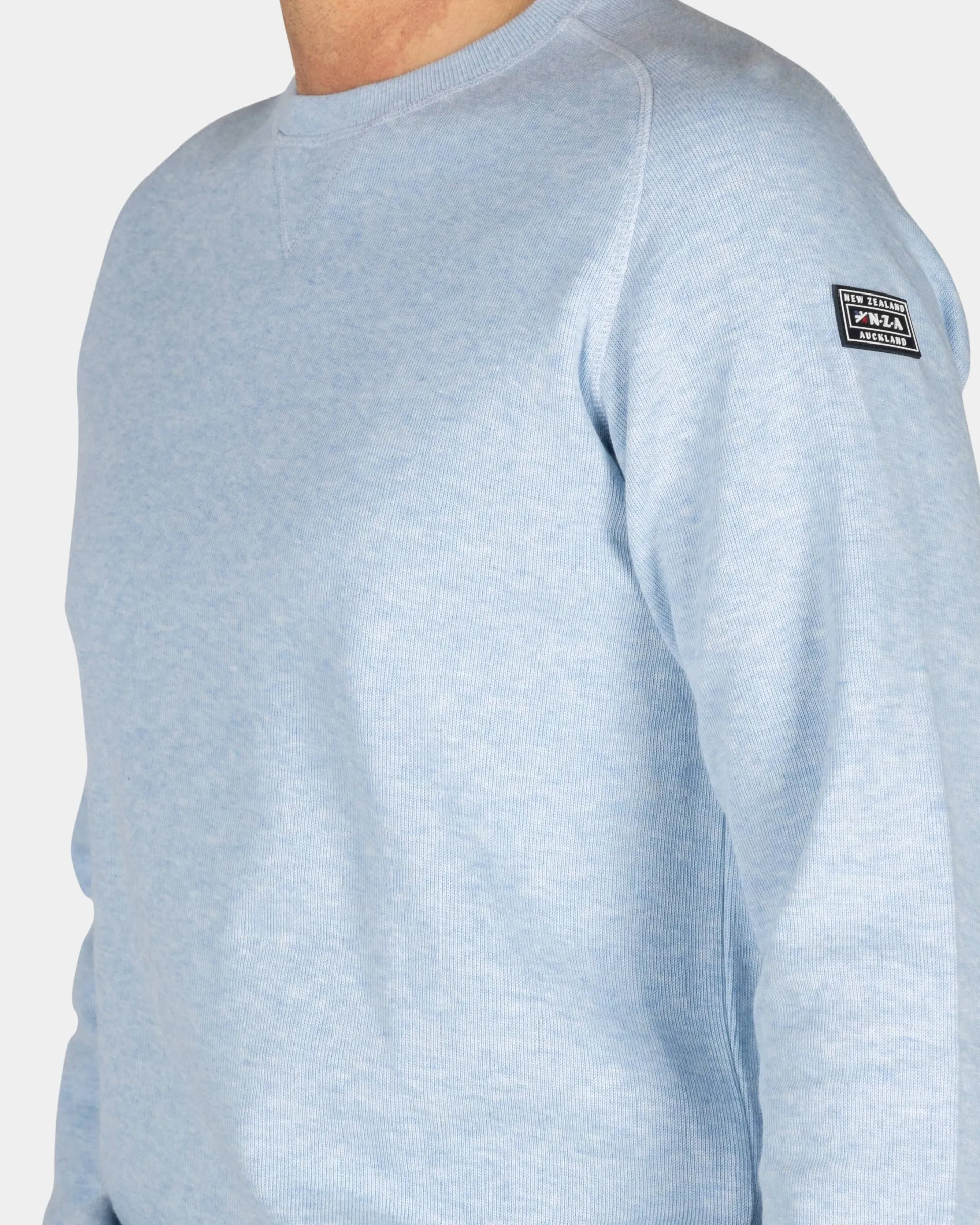 Light blue pullover with round neck