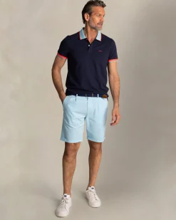 Navy cotton polo with light blue collar