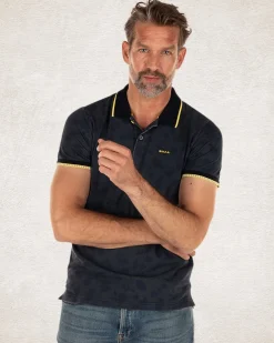 Navy polo shirt with leaf print