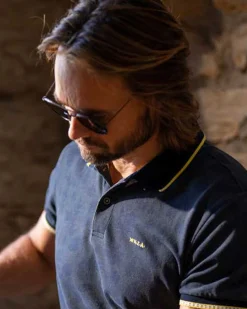 Navy polo shirt with leaf print