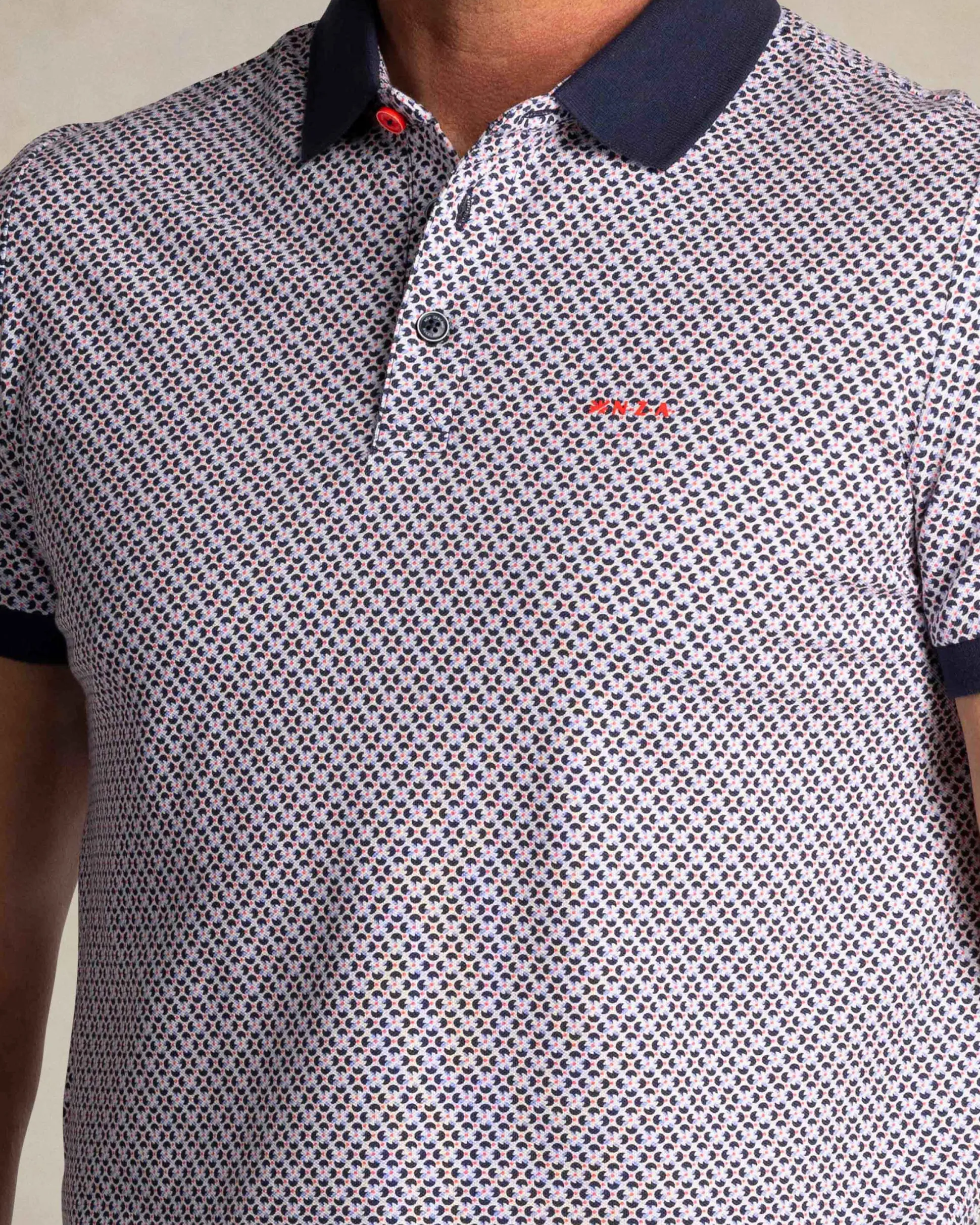 Navy polo with graphic print