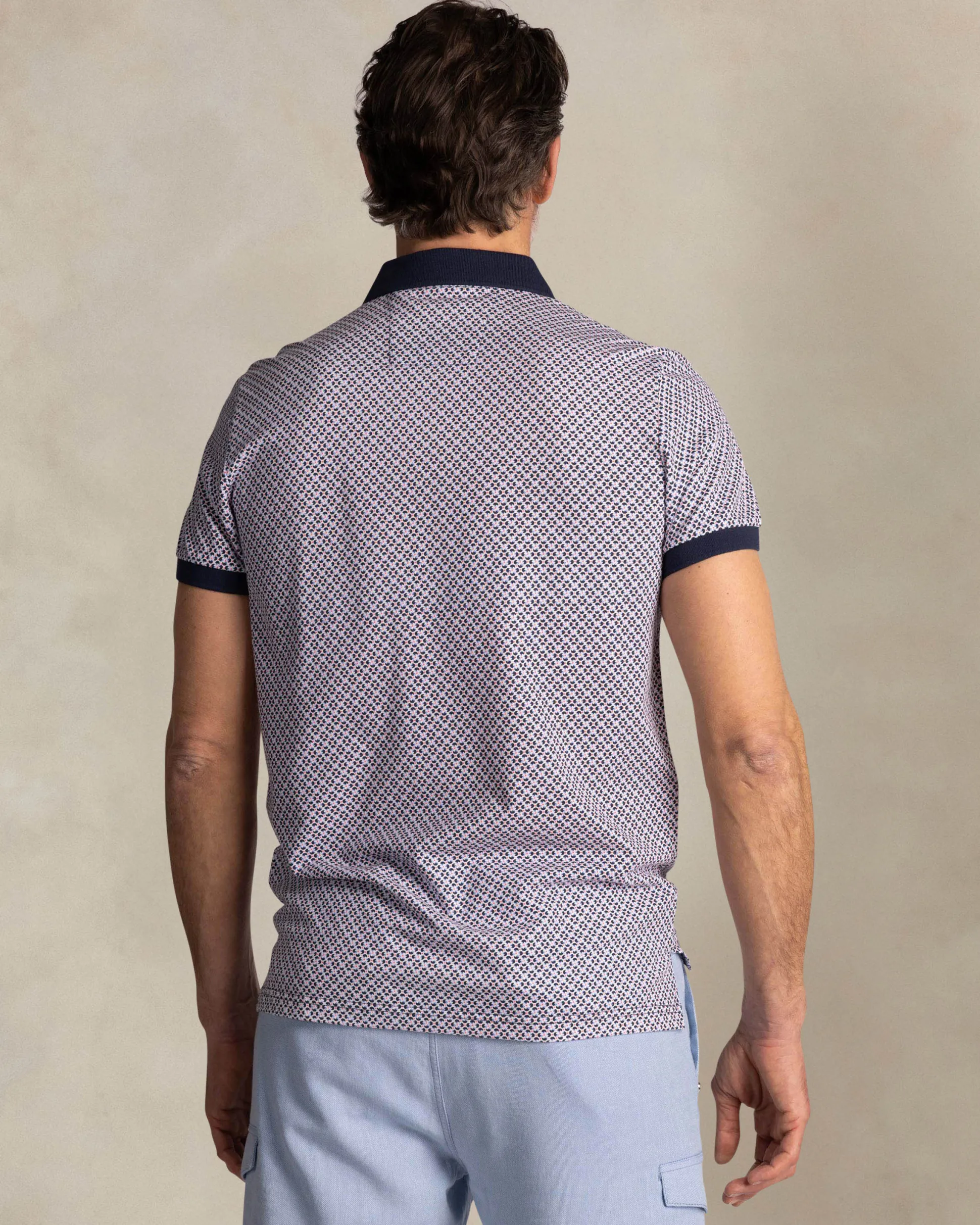 Navy polo with graphic print