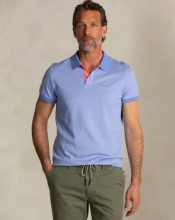 Solid light blue polo with orange details