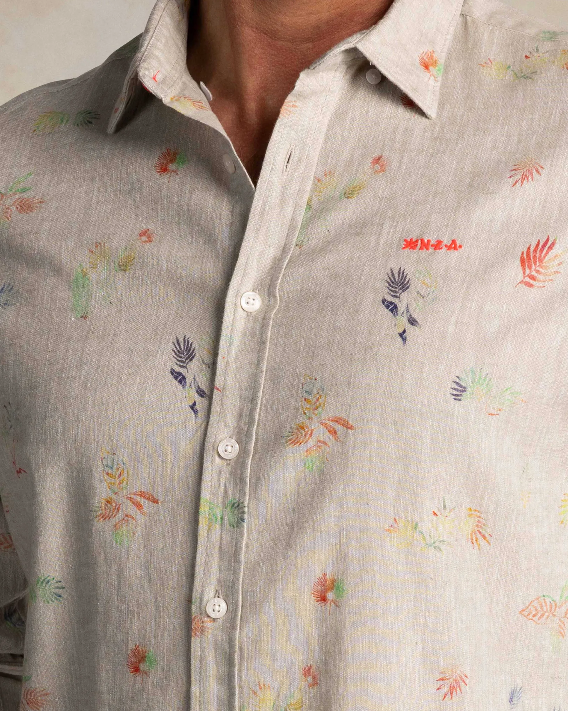 Taupe shirt with colorful floral print