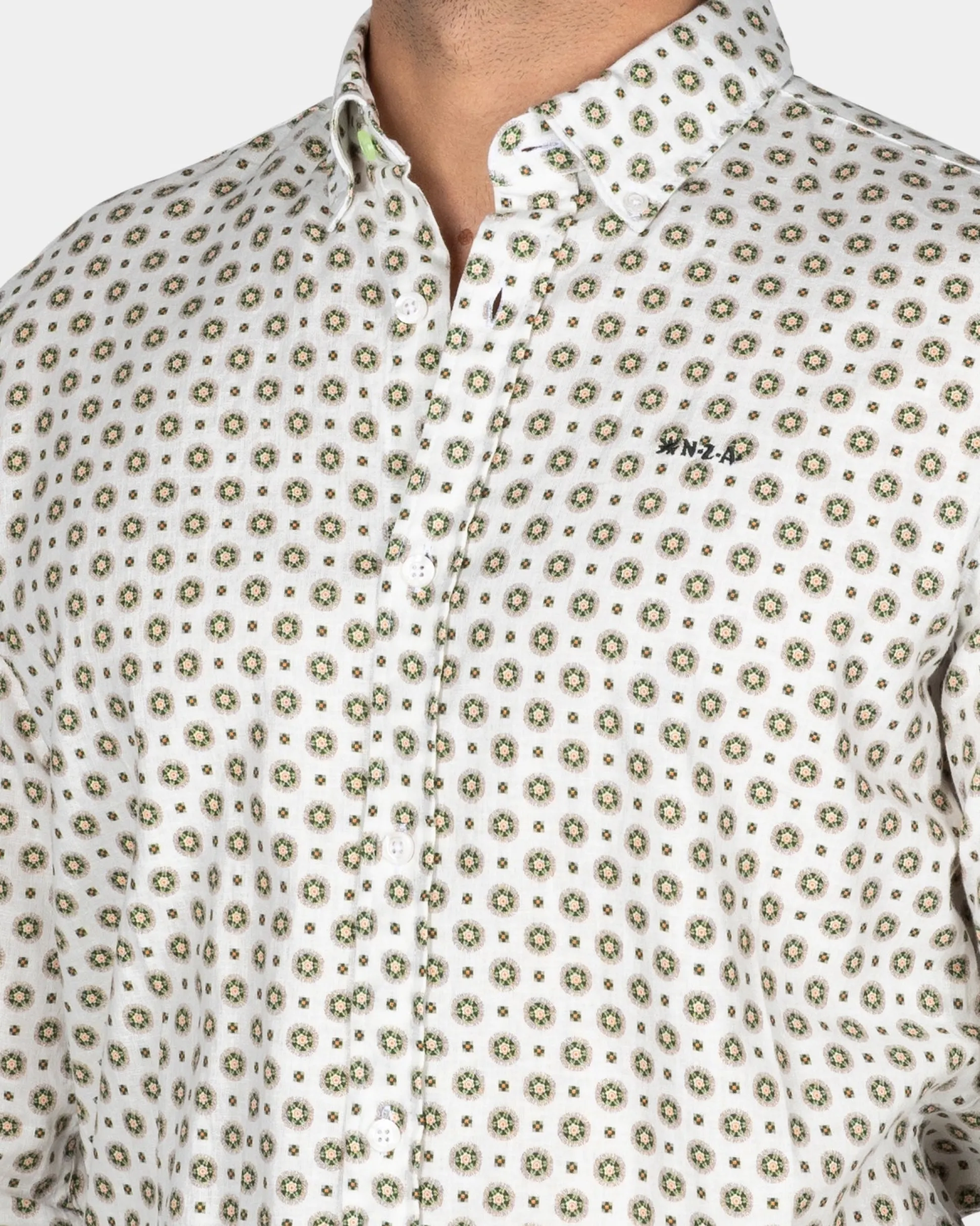 White Shirt with Green Graphic Print